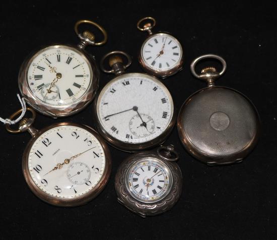 An engine turned silver Omega pocket watch, three other silver pocket watches and two silver fob watches.